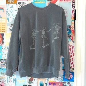 Urban Outfitters skeleton skateboard crew neck size small / medium